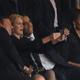US President Barack Obama (R) and British Prime Minister David Cameron pose for a picture with Denmark's Prime Minister Helle Thorning Schmidt (C) next to US First Lady Michelle Obama (R) during the memorial service of South African former president Nelson Mandela at the FNB Stadium (Soccer City) in Johannesburg on December 10, 2013. Mandela, the revered icon of the anti-apartheid struggle in South Africa and one of the towering political figures of the 20th century, died in Johannesburg on December 5 at age 95. AFP PHOTO / ROBERTO SCHMIDT (Photo credit should read ROBERTO SCHMIDT/AFP/Getty Images)
Photo by ROBERTO SCHMIDT/AFP/Getty Images